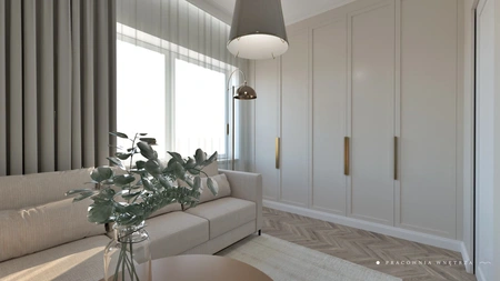 Wnętrze salonu w stylu boho, japandi i minimalistycznym z beżową sofą i roślinnością.