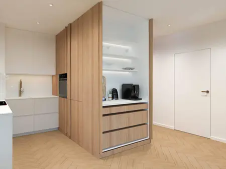 Wnętrze kuchni w stylu japandi i minimalistycznym z drewnianymi meblami.