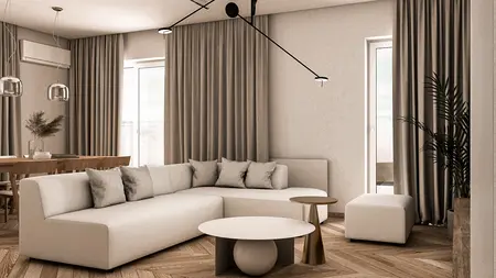 Salon w stylu japandi i soft minimalizm z jasnymi meblami i drewnianą podłogą.