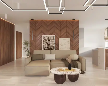 Nowoczesny salon w stylu glamour i japandi z brązową sofą, drewnianymi elementami i jasnym wystrojem.