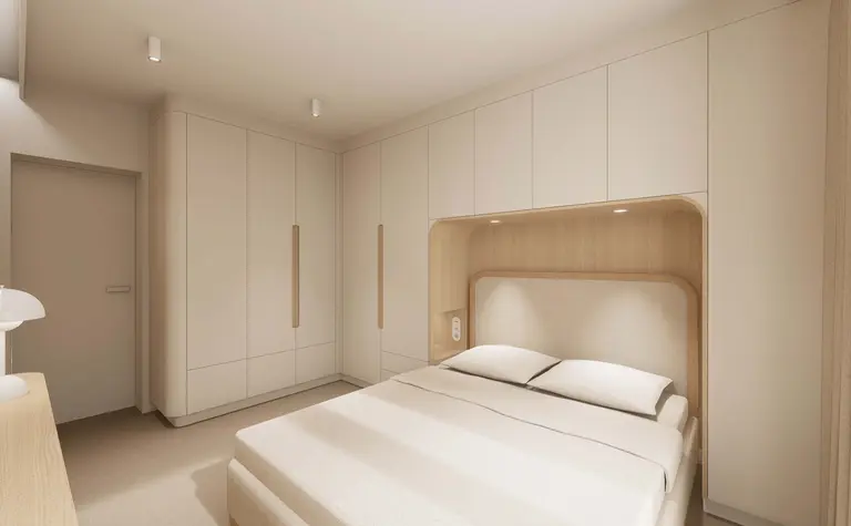 Wnętrze sypialni w stylu japandi i minimalistycznym z jasnymi meblami.