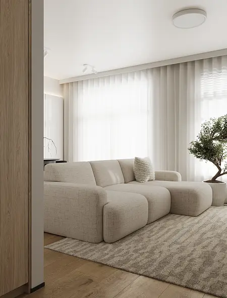 Wnętrze salonu w stylu industrialnym, japandi i minimalistycznym z jasną sofą i rośliną.