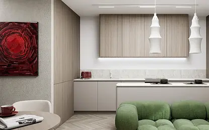 Wnętrze kuchni w stylu eklektycznym z zieloną sofą i drewnianymi meblami.