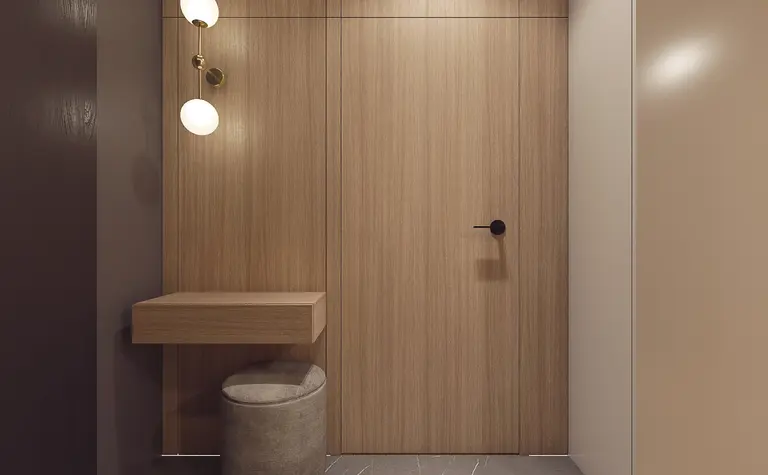 Nowoczesny przedpokój o minimalistycznym designie z drewnianymi detalami