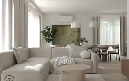 Wnętrze salonu w stylu japandi i minimalistycznym z jasnymi meblami.