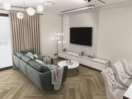 Wnętrze salonu w stylu eklektycznym z zieloną sofą, jasnymi zasłonami i nowoczesnym oświetleniem.
