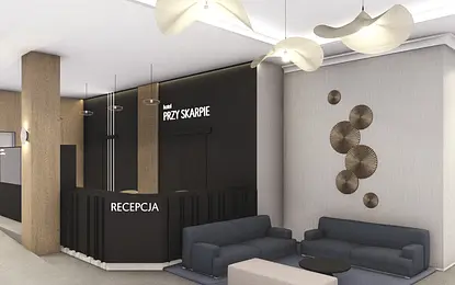 Recepcja hotelowa w stylu industrialnym i minimalistycznym z ciemnymi meblami.