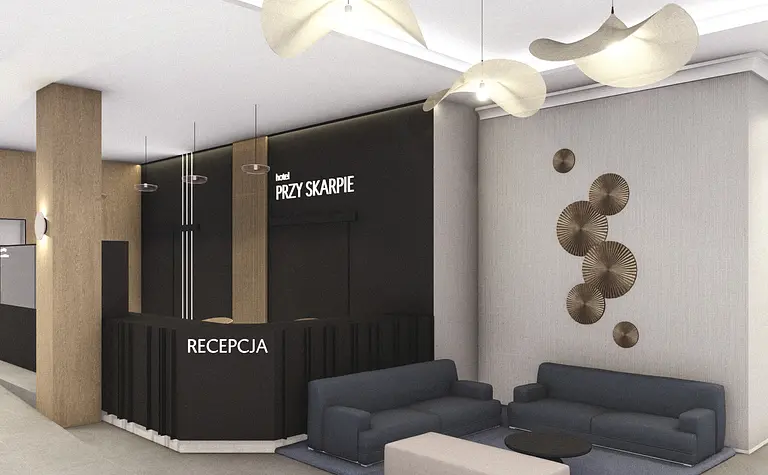 Recepcja hotelowa w stylu industrialnym i minimalistycznym z ciemnymi meblami.