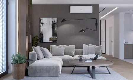 Wnętrze salonu z minimalistycznym wystrojem, szare ściany, nowoczesne meble.