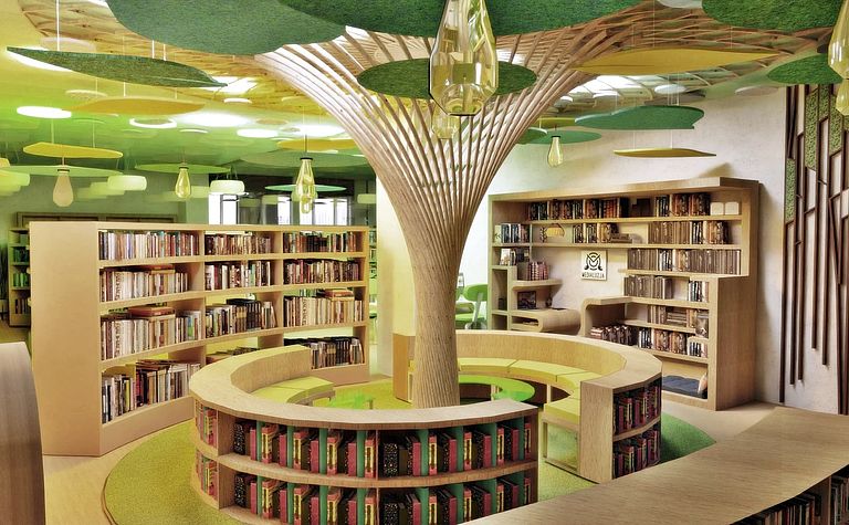 Współczesna biblioteka z drewnianymi regałami i zielonymi detalami