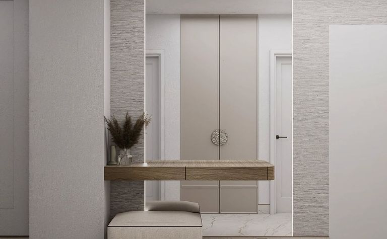 Przedpokój w stylu minimaluxe z beżowymi meblami i dodatkami w soft minimalizm.