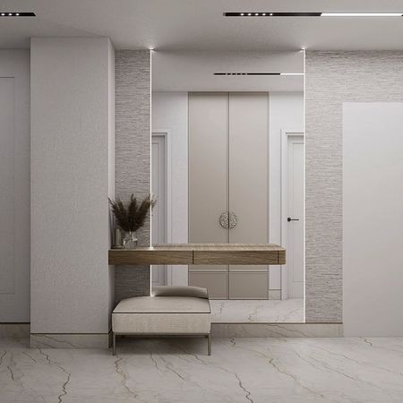 Przedpokój w stylu minimaluxe z beżowymi meblami i dodatkami w soft minimalizm.