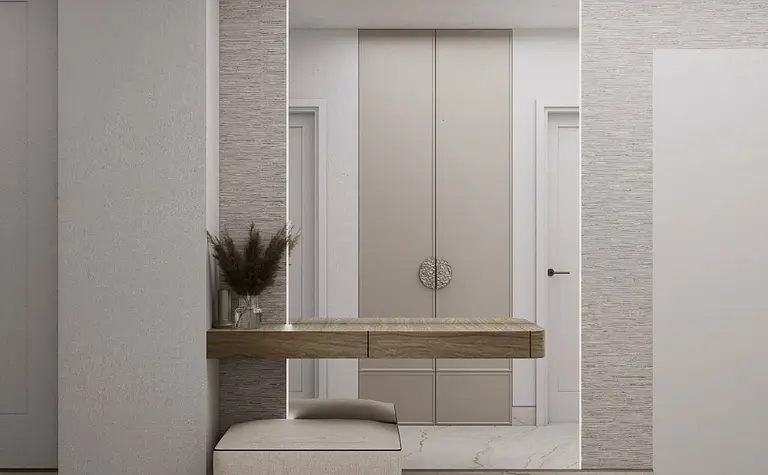 Przedpokój w stylu minimaluxe z beżowymi meblami i dodatkami w soft minimalizm.