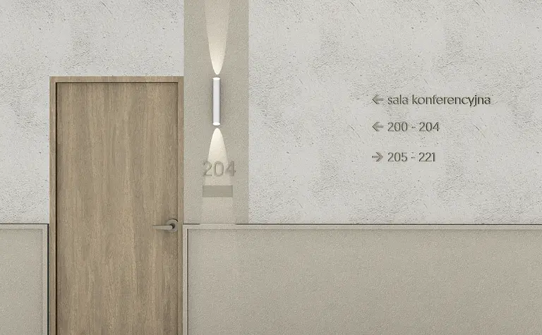 Korytarz z minimalistycznym oświetleniem i drewnianymi akcentami w stylu industrialnym.