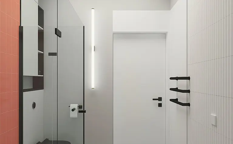 Wnętrze łazienki z minimalistycznym designem, industrialnymi akcentami, nowoczesną armaturą i elementami soft minimalizmu.