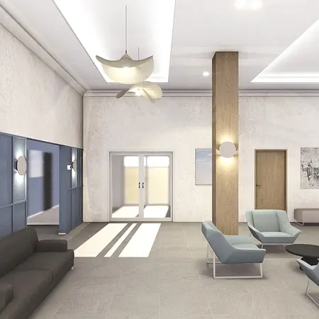 Wnętrze salonu w stylu industrialnym i minimalistycznym z szarymi meblami.