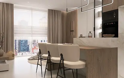 Wnętrze kuchni w stylu japandi i współczesnym z drewnianym blatem i białymi meblami.