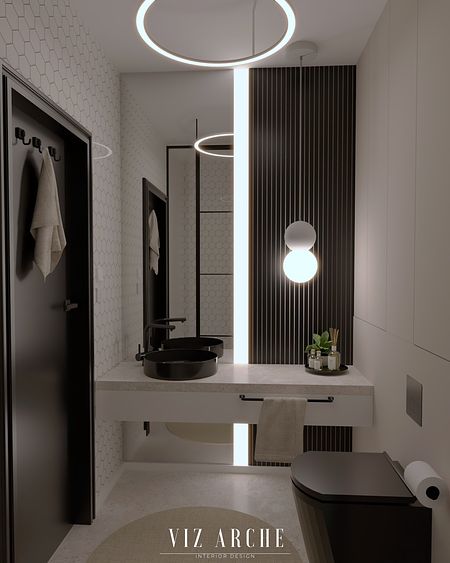 Czarno - beżowa, mała łazienka.