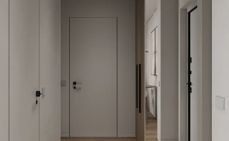 Przedpokój w stylu industrialnym z minimalistycznym designem i nowoczesnymi akcentami.