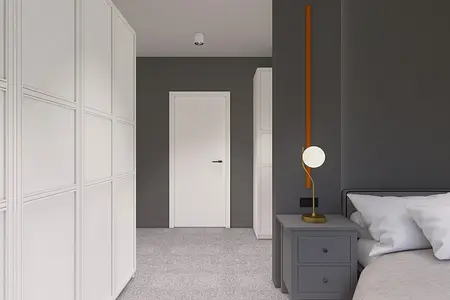 Garderoba w minimalistycznym stylu z białymi meblami i szarymi akcentami