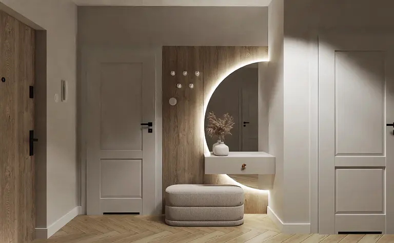 Wnętrze przedpokoju w stylu glamour, japandi i minimalistycznym z drewnianymi akcentami.