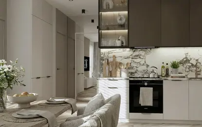 Wnętrze kuchni z marmurowym blatem, drewnianym stołem oraz nowoczesnym designem w stylu quiet luxury.
