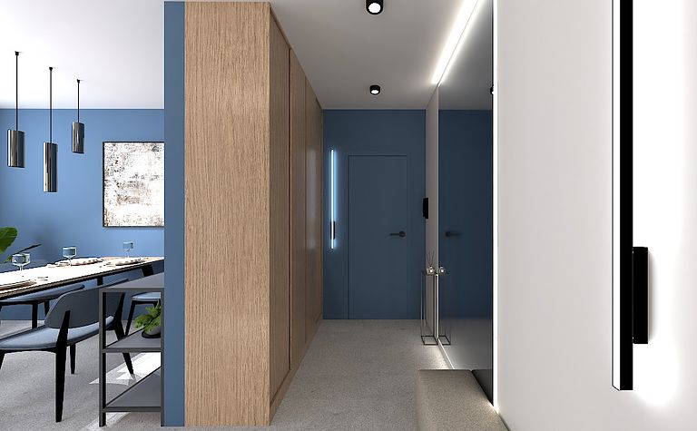 Wnętrze minimalistycznego korytarza z drewnianymi elementami i niebieskimi ścianami.