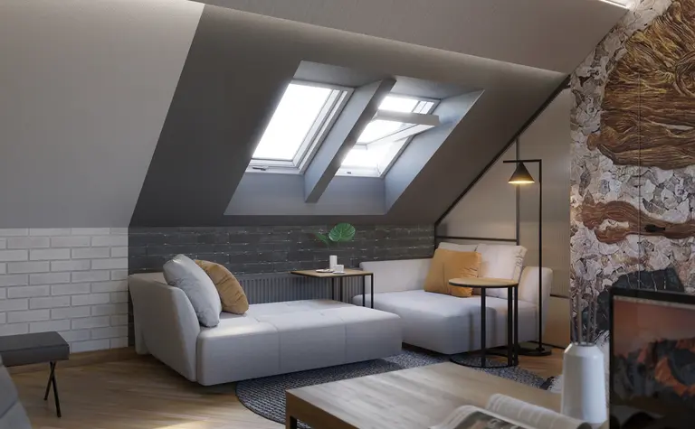 Wnętrze poddasza z minimalistycznym designem, nowoczesnym umeblowaniem i tradycyjnymi dodatkami.