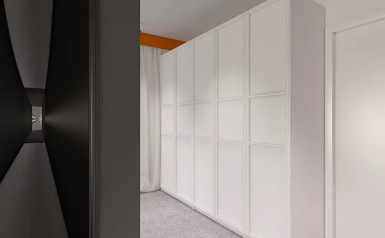 Garderoba w stylu minimalistycznym i skandynawskim z białymi meblami.