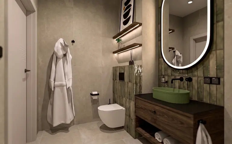Wnętrze nowoczesnej łazienki z zieloną umywalką i drewnianymi detalami.