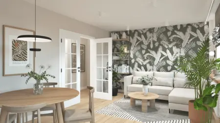 Wnętrze salonu w stylu boho i skandynawskim z roślinami.