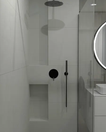 Nowoczesna łazienka z minimalistycznym prysznicem i białymi meblami.
